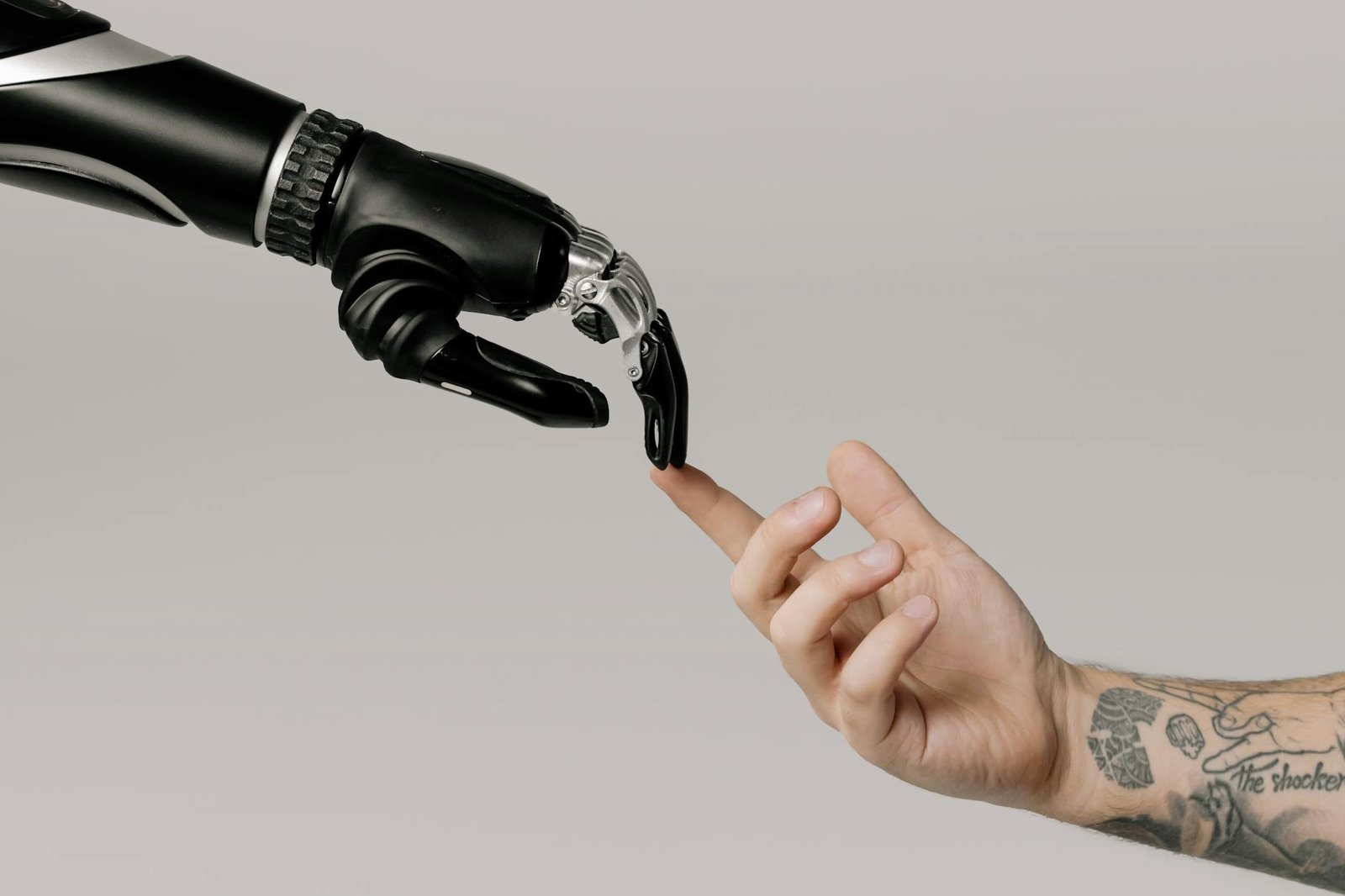 bionic hand and human hand finger pointing It services in elk grove