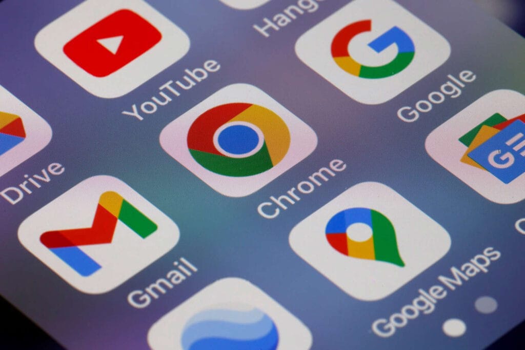 Close-up of smartphone screen displaying various app icons including Chrome, Gmail, and YouTube, relevant for tech support solutions.