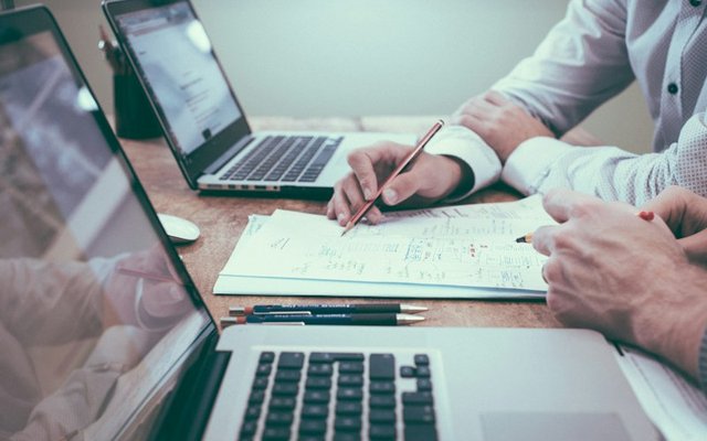 Regulatory compliance auditor reviewing CMMC and HIPAA security controls
